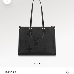 Authentic LOUIS VUITTON Monogram Empreinte on the Go MM Shoulder Bag.